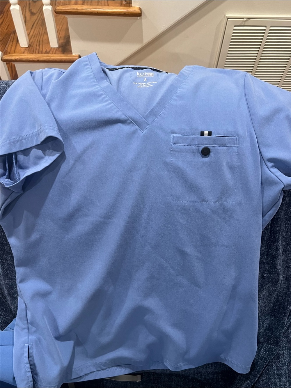 koi NEXT GEN Women's V-Neck Scrub Top in Light Blue